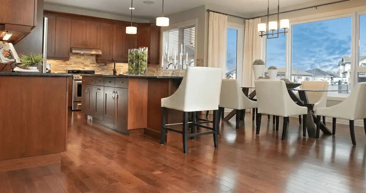 A modern kitchen with professionally installed wood flooring in Marietta, GA