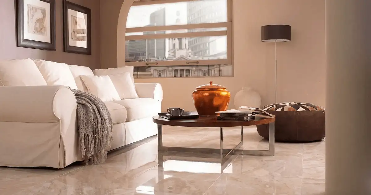 Modern living room with professionally installed marble flooring, a beige sofa, coffee table in Marietta, GA