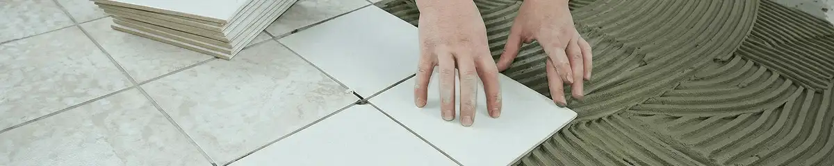 Professional installing white tile floors in Marietta, GA