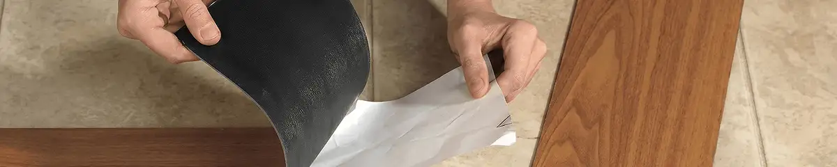 A professional installing vinyl flooring in Marietta, GA